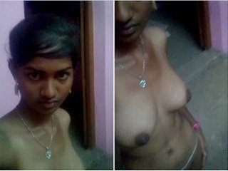 Pretty Indian girl flaunts her milk cans and twat in a  flick