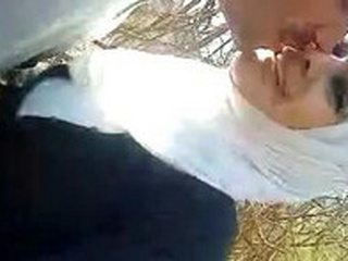 Arab nymph pleasing herself and providing oral outdoors