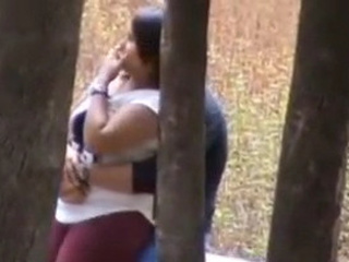 Audacious school sweetheart performs a risky oral romp action in an outdoor public space