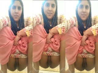 Kinky Punjabi bhabhi caught on camera pissing in Indian closet