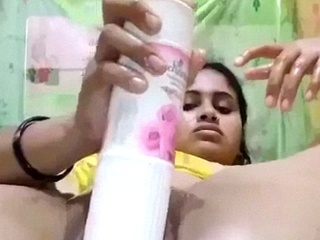 Desi's solo session with a bottle of air freshener